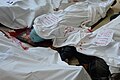 Ukrainian Red Cross volunteers giving first medical aid to a wounded protester in a makeshift hospital in the hotel Ukraine lobby. Clashes in Kyiv, Ukraine. Events of February 20, 2014-2