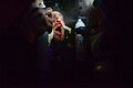 Injured protester receiving first medical aid in field. Kyiv, Ukraine. Jan 22, 2014