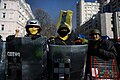 Line of protesters holding protective position against protesters. Clashes in Kyiv, Ukraine. Events of February 18, 2014