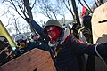 Maked protester seen during clashes in Kyiv, Ukraine. Events of February 18, 2014