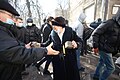 Protesters preparing brickdtone to fight back attacks during clashes in Kyiv, Ukraine. Events of February 18, 2014