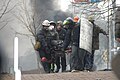 Protesters transporting wounded from the field. Clashes in Kyiv, Ukraine. Events of February 18, 2014