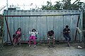 Underaged refugees pictured on a swing set arranged in Vial camp. Chios, Grece, Aegean Sea. 27 September, 2016.jpg