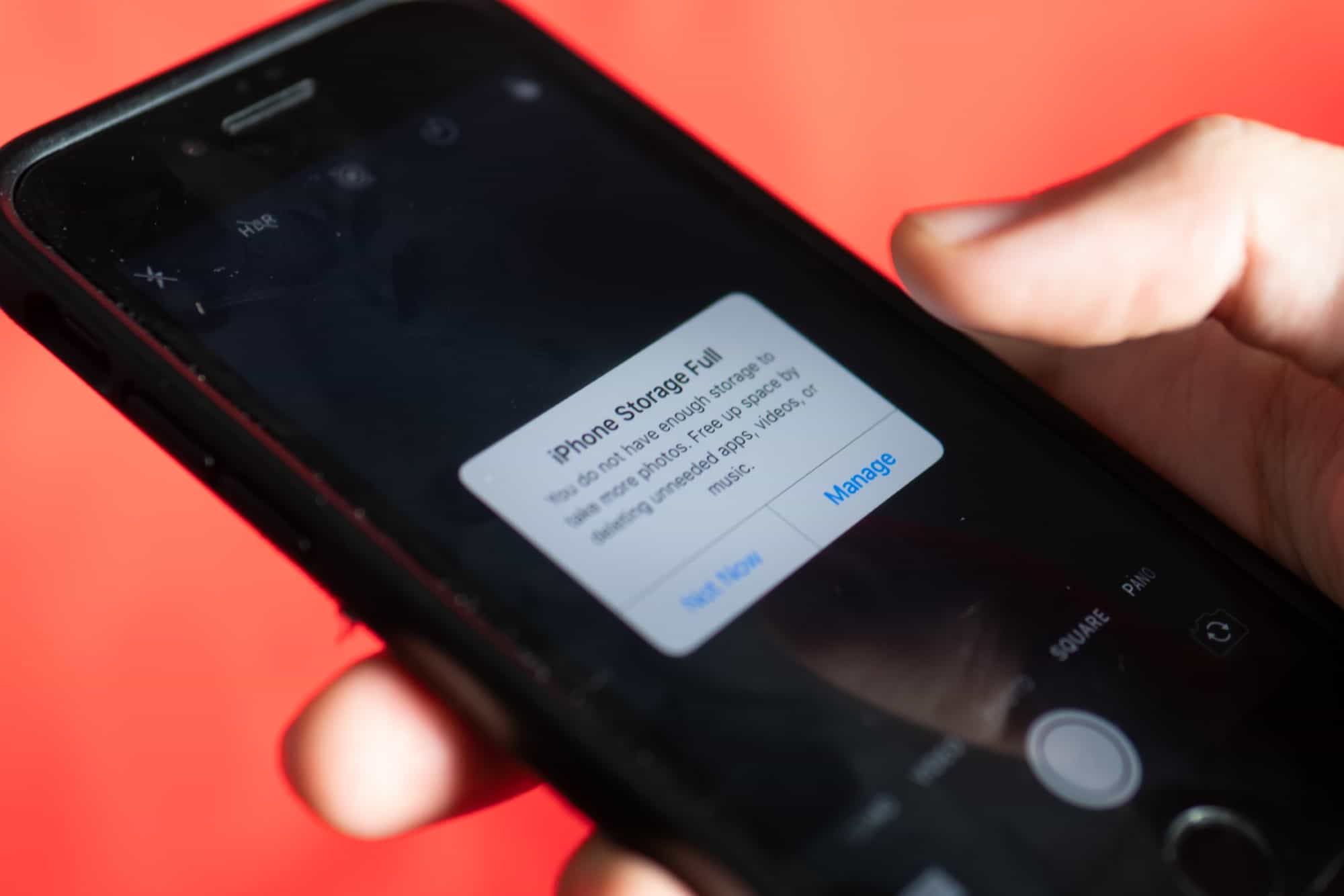 iPhone 7 with error message on screen saying "iPhone Storage Full"